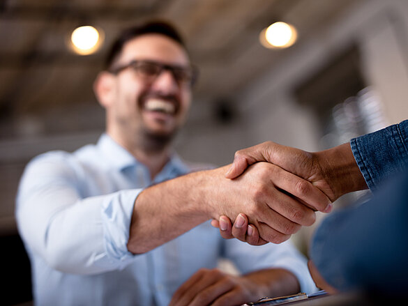 Business people shaking hands.